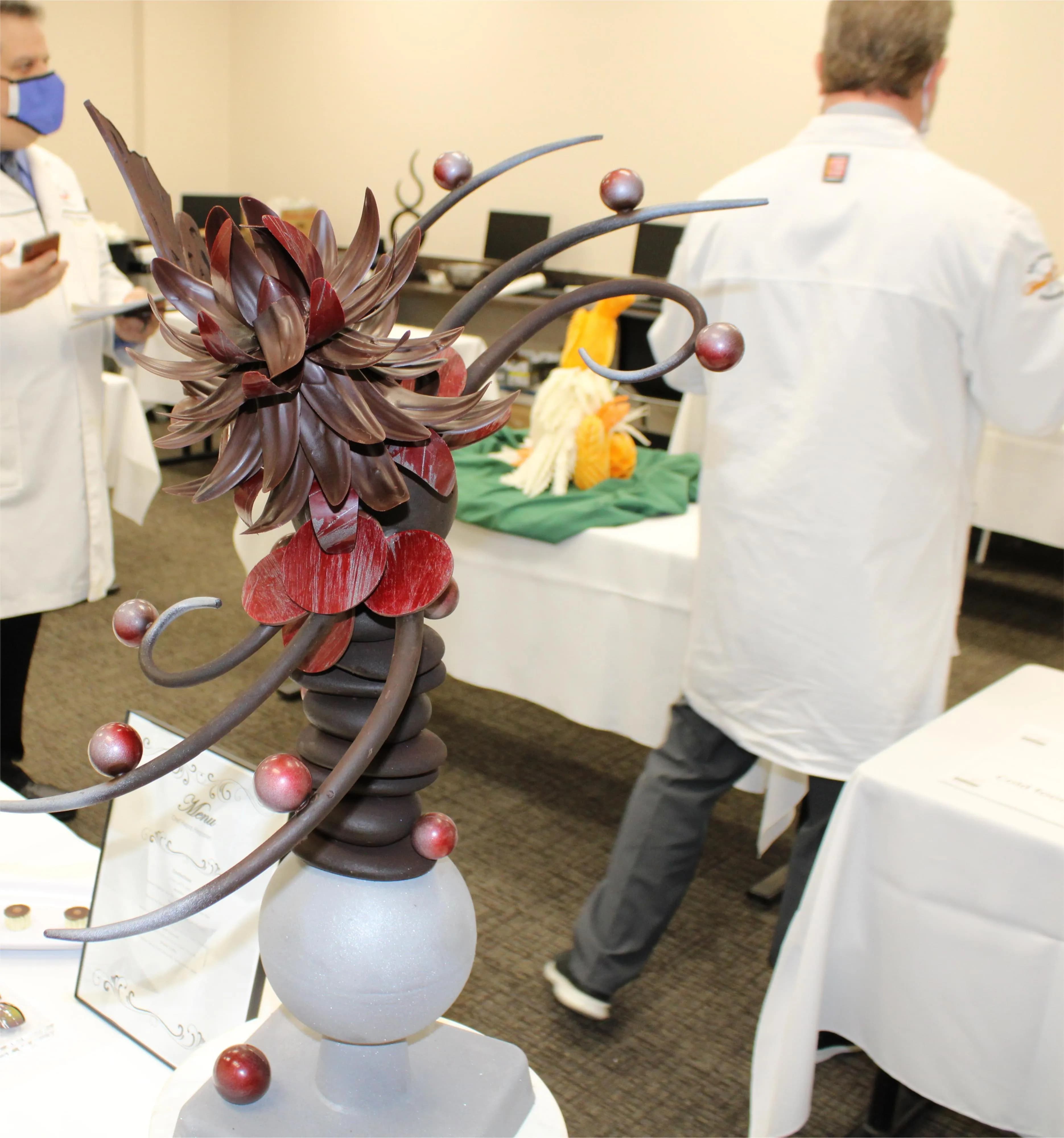 Chef cooking under heat lamp
